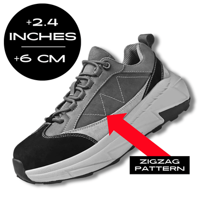 FORCIANO NORTHRIDGE gray zigzag-pattern height increasing sneakers shown from a front three-quarter angle with a 6 cm / 2.4 inches height graphic and zigzag pattern arrow.