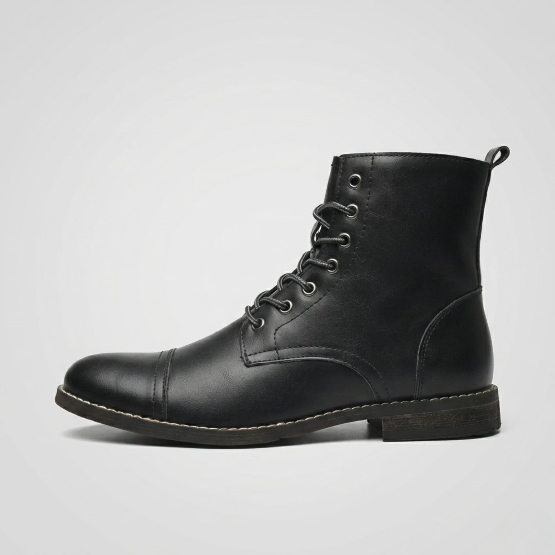 FORCIANO OUTLAW black leather elevator boot shown in a clean side profile with lace-up closure, cap toe and visible leather finish.