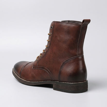 FORCIANO OUTLAW dark brown leather elevator boot shown from a rear three-quarter view, highlighting the ankle profile, heel and leather finish.