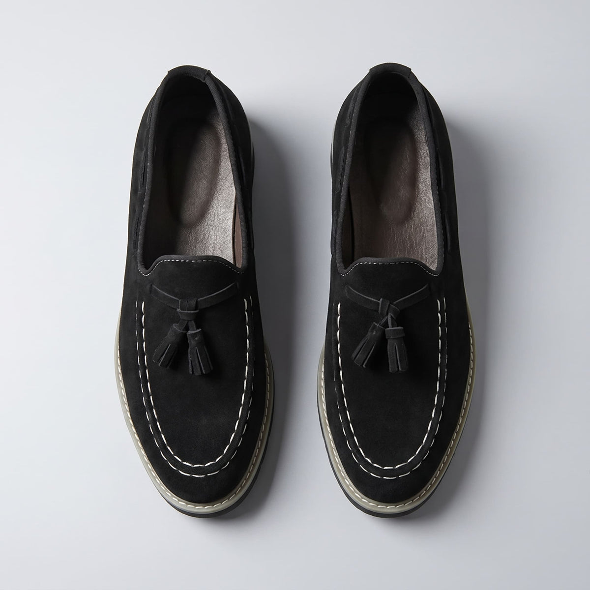 FORCIANO PARAGON Height Increasing Loafers in Black with leather upper, pair shown from the top view with tassels and contrast stitching.