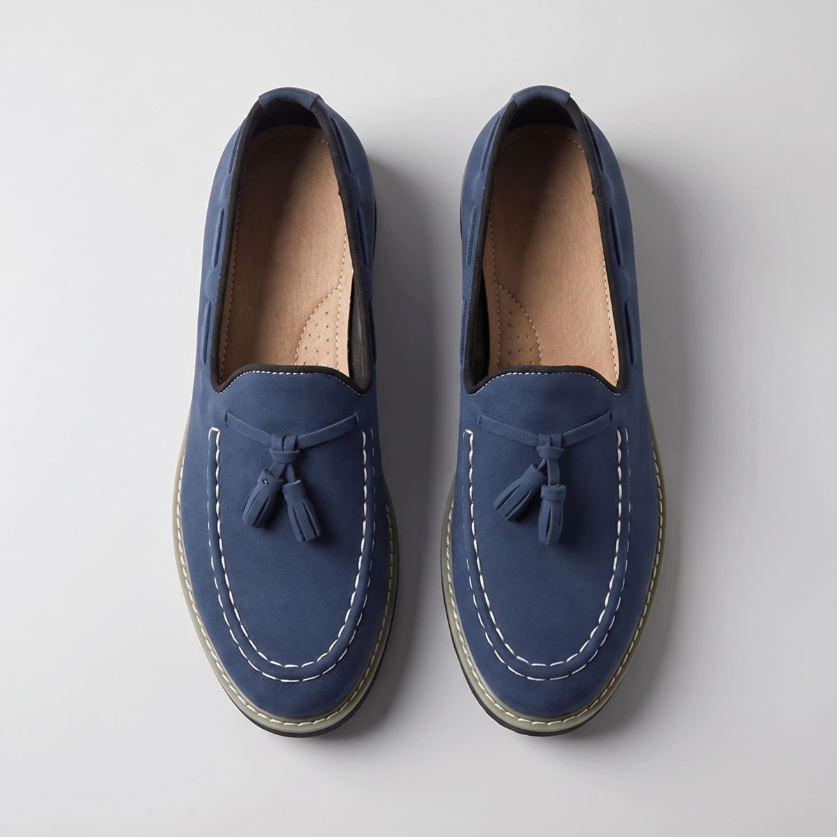FORCIANO PARAGON Height Increasing Loafers in Blue with leather upper, pair displayed from the top view with tassel details.