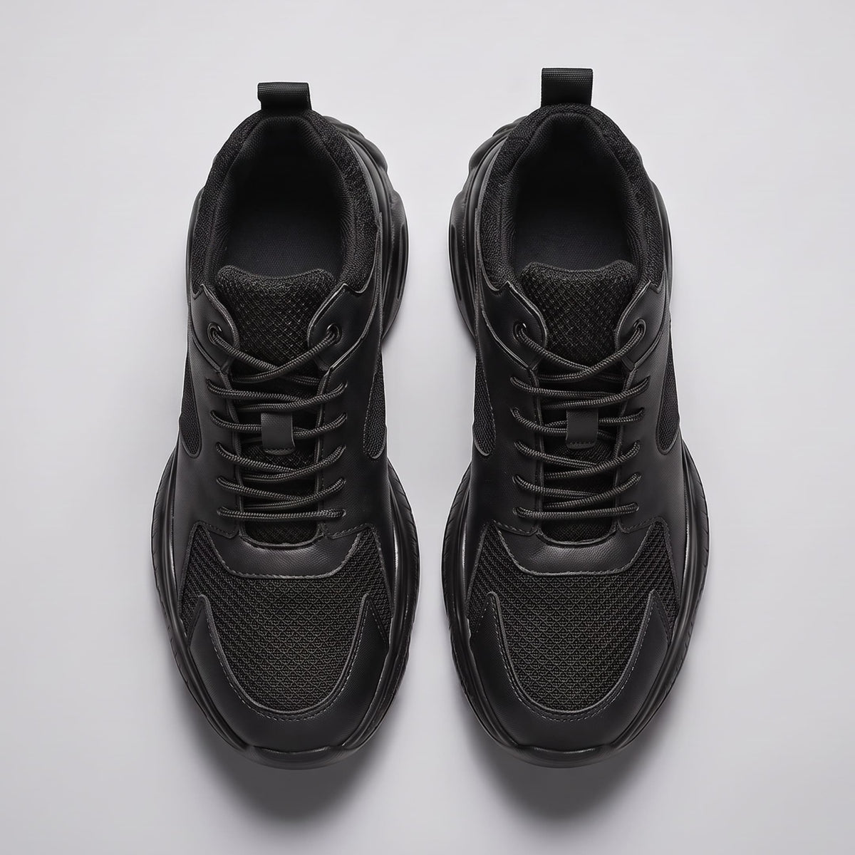 FORCIANO PEGASUS black height increasing sneakers shown as a pair from the top with lace-up and mesh details visible.