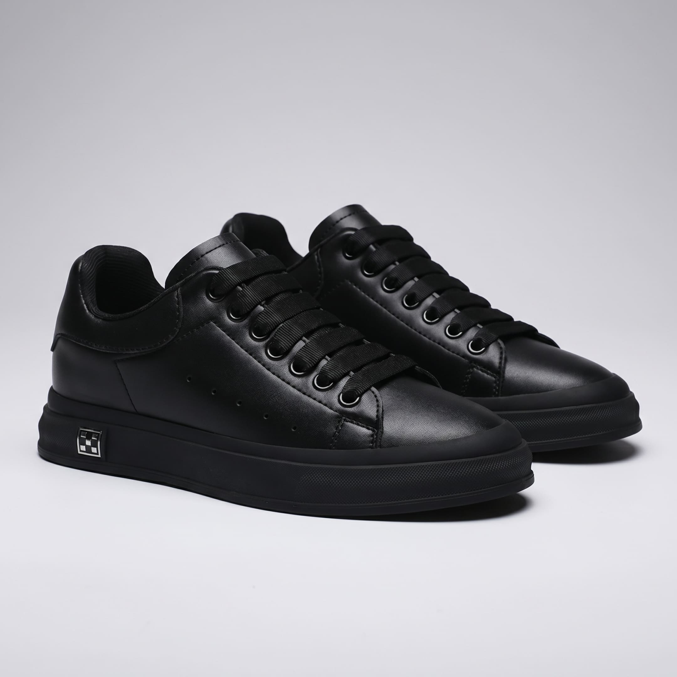 FORCIANO PORTOFINO Black Height Increasing Shoes with premium leather uppers, displayed as a pair from the front three-quarter angle.