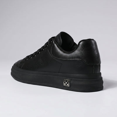 FORCIANO PORTOFINO black Elevator Sneaker with a premium leather upper, shown from a rear three-quarter side angle with the black sole visible.