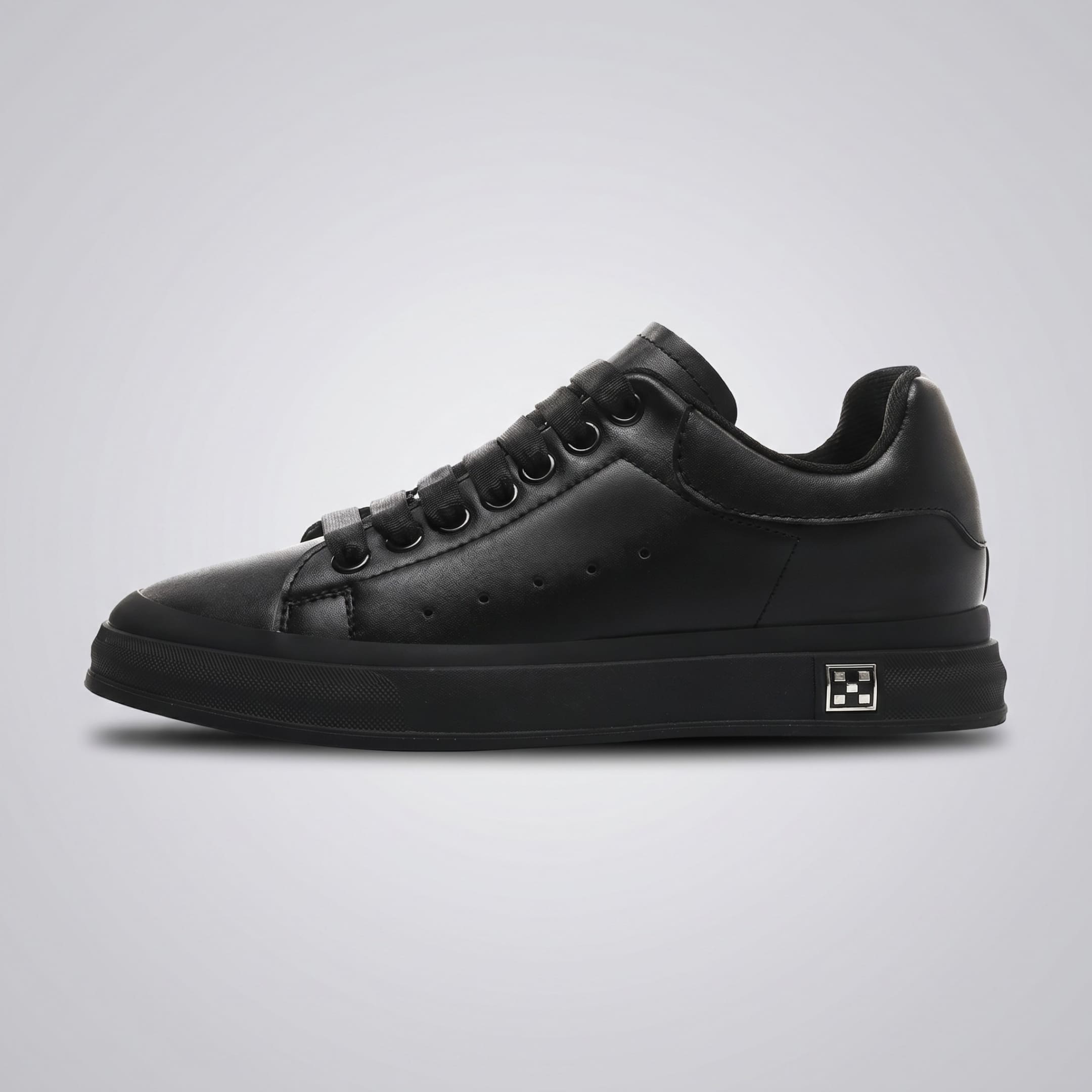 FORCIANO PORTOFINO black Elevator Sneaker with premium leather upper and matching black sole shown from the side profile.