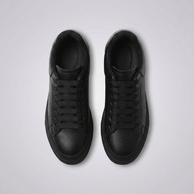 FORCIANO PORTOFINO black leather sneakers shown side by side from the top view with black laces and matching soles.