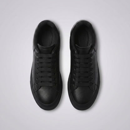 FORCIANO PORTOFINO black leather sneakers shown side by side from the top view with black laces and matching soles.