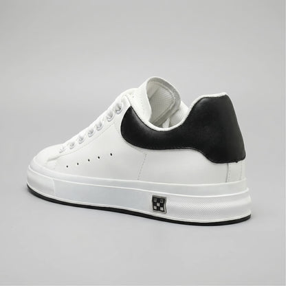 FORCIANO PORTOFINO white leather sneaker with a black heel panel, shown from a rear three-quarter angle with the raised sole profile visible.