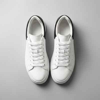 FORCIANO PORTOFINO white leather sneakers with black heel panels, shown as a pair from the top view.