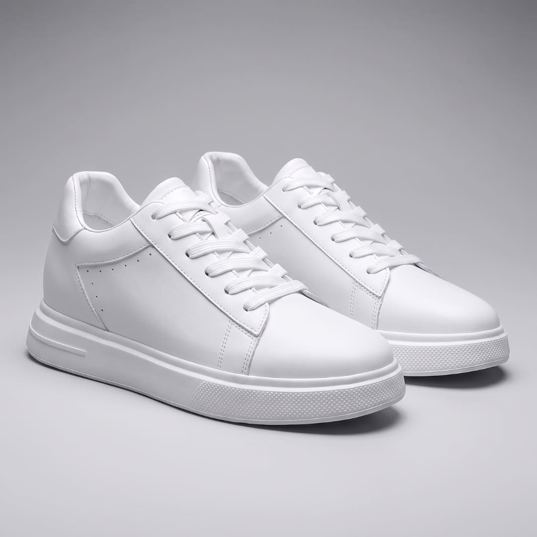 FORCIANO POSITANO white height increasing sneakers with premium leather uppers shown as a pair from the front three-quarter angle.