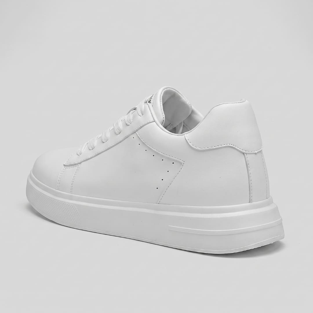 FORCIANO POSITANO white height increasing sneakers with premium leather upper shown as a single shoe from the rear three-quarter angle.