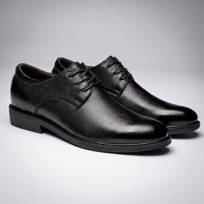 Pair of black Crocodile-style FORCIANO PRESTIGE Height Increasing Shoes shown from a front three-quarter angle.