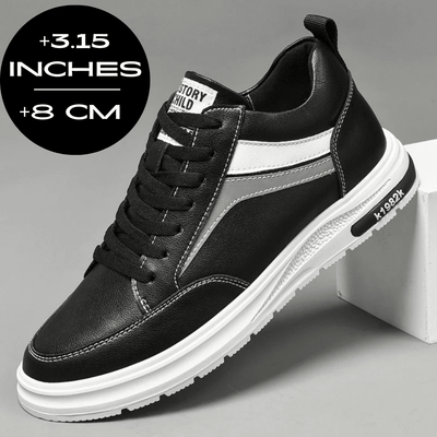 FORCIANO PRIME black and white height increasing sneakers with gray reflective accents shown from a front three-quarter angle with an 8 cm / 3.15" height increase graphic.