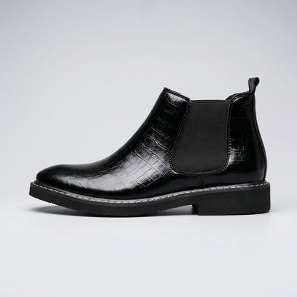 FORCIANO RAPTOR men's elevator boots in black shown in a clean side profile with elastic side panel, pull tab and textured upper.