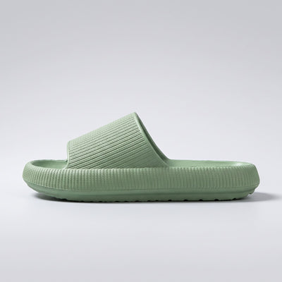 FORCIANO REESE green height increasing slippers for women shown in a full side profile with textured lightweight EVA upper and raised slide sole.