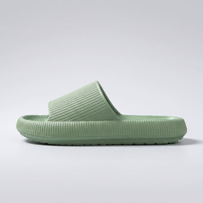 FORCIANO REESE green height increasing slippers for women shown in a full side profile with textured lightweight EVA upper and raised slide sole.