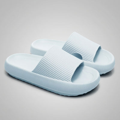 FORCIANO REESE light blue height increasing slippers for women shown as a pair from a front three-quarter angle with textured lightweight EVA uppers.