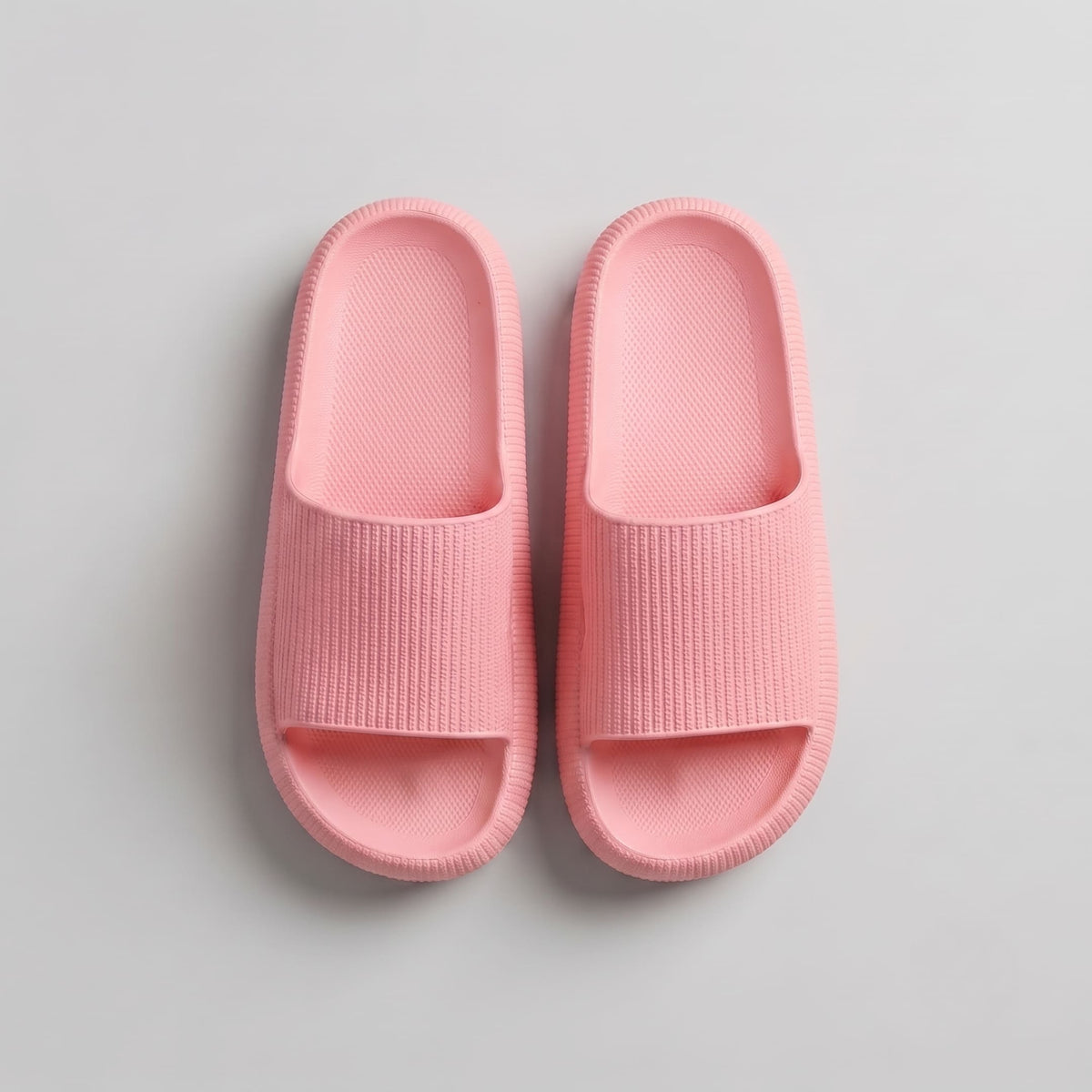 FORCIANO REESE pink height increasing slippers for women displayed as a pair in a top view with textured lightweight EVA uppers and footbeds.