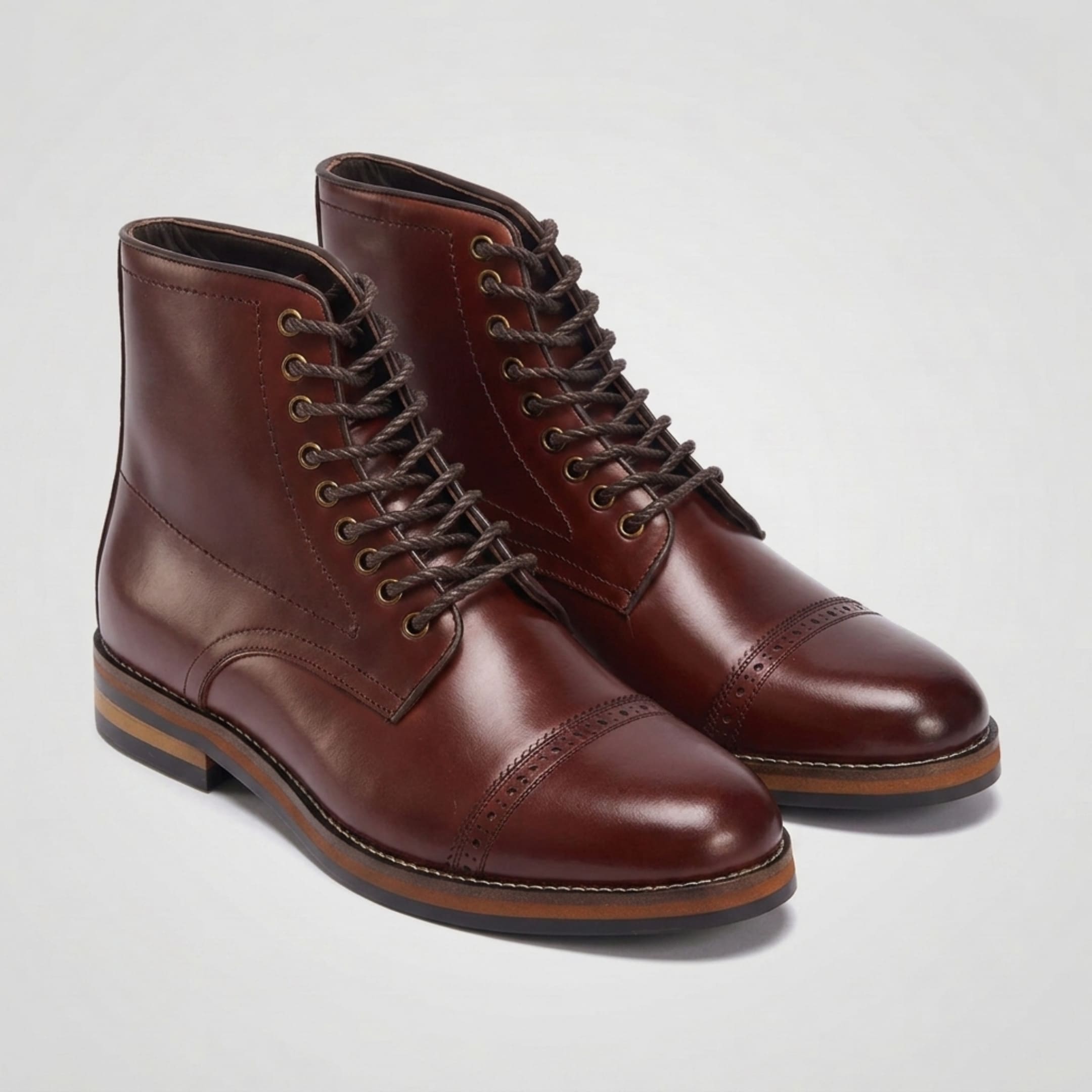 FORCIANO ROMANO brown height increasing boots with genuine leather uppers shown as a pair from a front three-quarter angle.