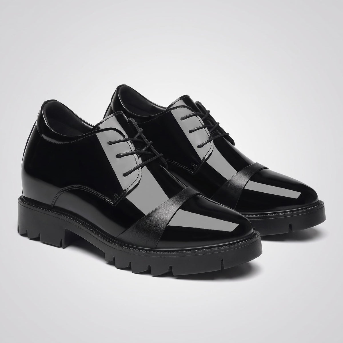 FORCIANO ROYALE black Height Increasing Shoes displayed as a pair from a front three-quarter angle with sleek leather design and lace closure.