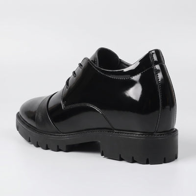 FORCIANO ROYALE black Height Increasing Shoes shown from a rear three-quarter angle with sleek leather design and thick black sole.
