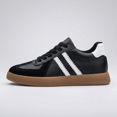FORCIANO SABER black height increasing sneaker with white stripes, gum sole and split leather upper shown in a clean side profile.