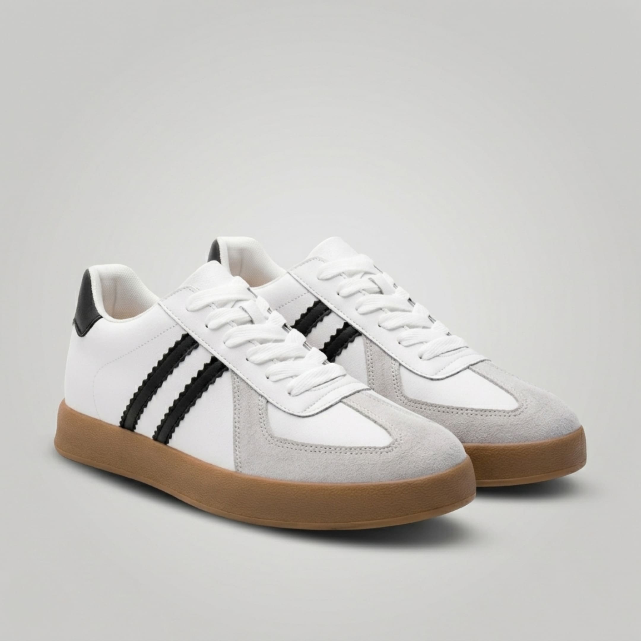 FORCIANO SABER white height increasing sneakers with black stripes, gum soles and split leather uppers shown as a pair from a front three-quarter angle.