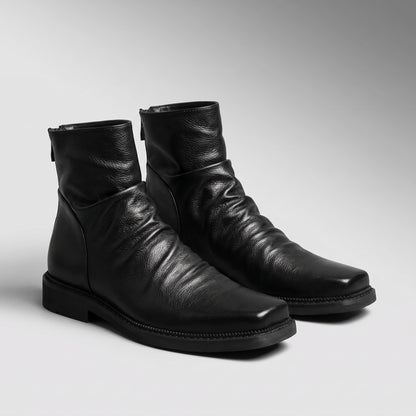 FORCIANO SALVATI black height increasing boots with smooth microfiber uppers displayed as a pair from a front three-quarter angle.