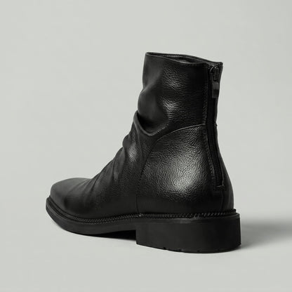 FORCIANO SALVATI black height increasing boot with smooth microfiber upper shown from a rear three-quarter angle with the back zipper visible.