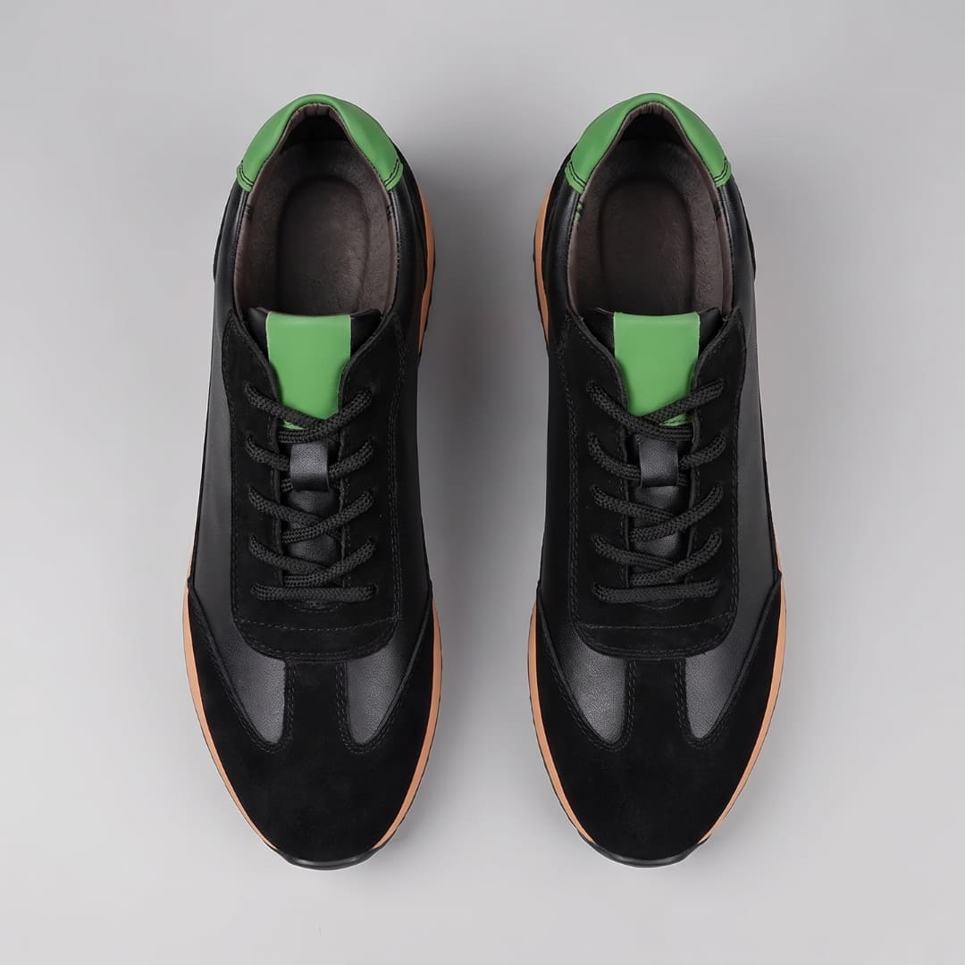 FORCIANO SALVATORE black height increasing sneakers with cow suede uppers and green accents shown as a pair from the top with black laces.