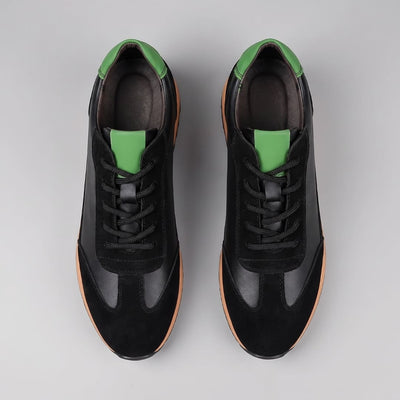 FORCIANO SALVATORE black height increasing sneakers with cow suede uppers and green accents shown as a pair from the top with black laces.