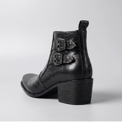 FORCIANO SCAROSSO black genuine leather height increasing boot shown from the rear three-quarter angle with double buckles, textured upper and block heel.