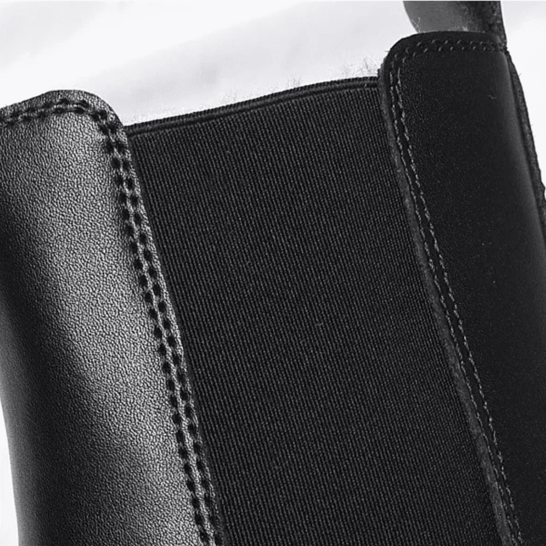 FORCIANO SENTINEL black elevator Chelsea boot close-up showing the elastic side panel, stitching, and premium leather upper.