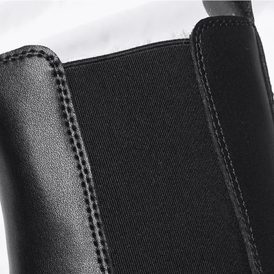 FORCIANO SENTINEL black elevator Chelsea boot close-up showing the elastic side panel, stitching, and premium leather upper.