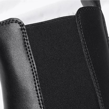 FORCIANO SENTINEL black elevator Chelsea boot close-up showing the elastic side panel, stitching, and premium leather upper.