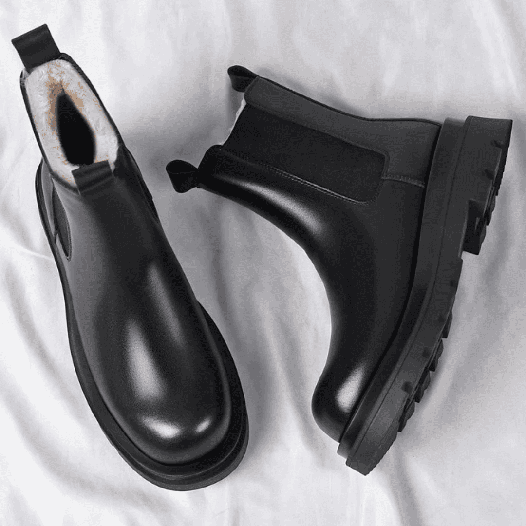 FORCIANO SENTINEL black elevator Chelsea boots displayed as a pair from top and side angles, showing premium leather uppers and lugged soles.