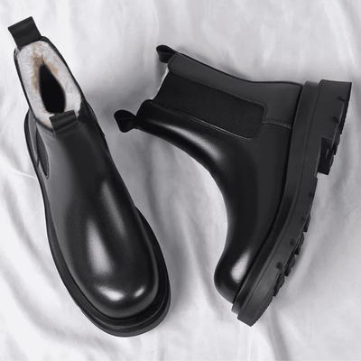 FORCIANO SENTINEL black elevator Chelsea boots displayed as a pair from top and side angles, showing premium leather uppers and lugged soles.