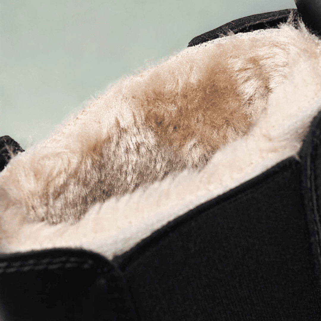 Close-up of the visible wool-cushioned lining inside a FORCIANO SENTINEL black elevator Chelsea boot.