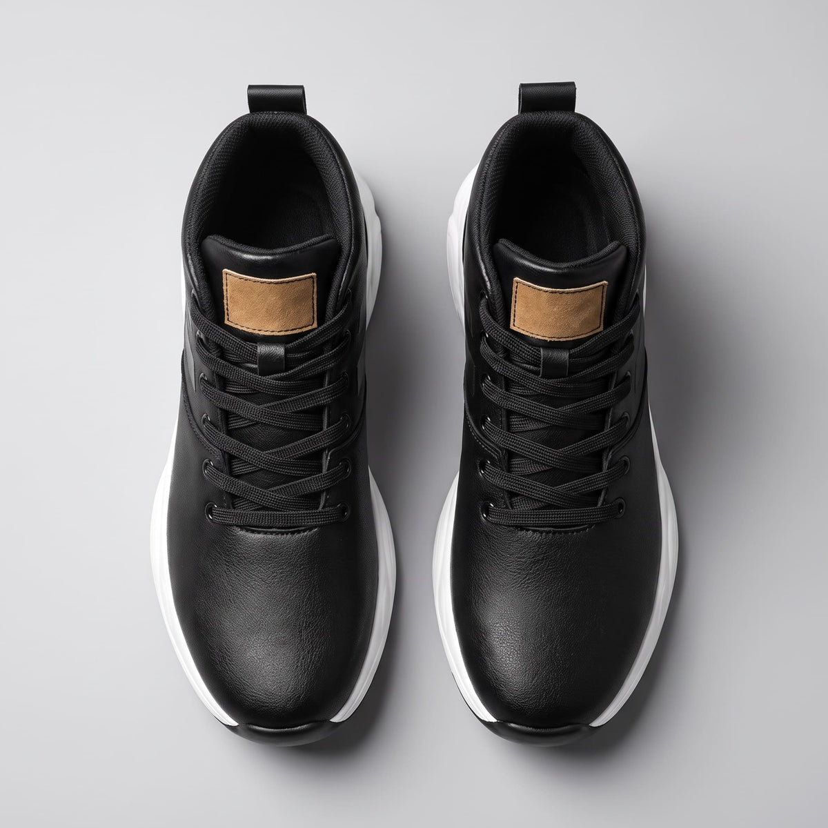 FORCIANO SONIC Height Boosting Sneakers in black with leather upper, shown as a pair from above.
