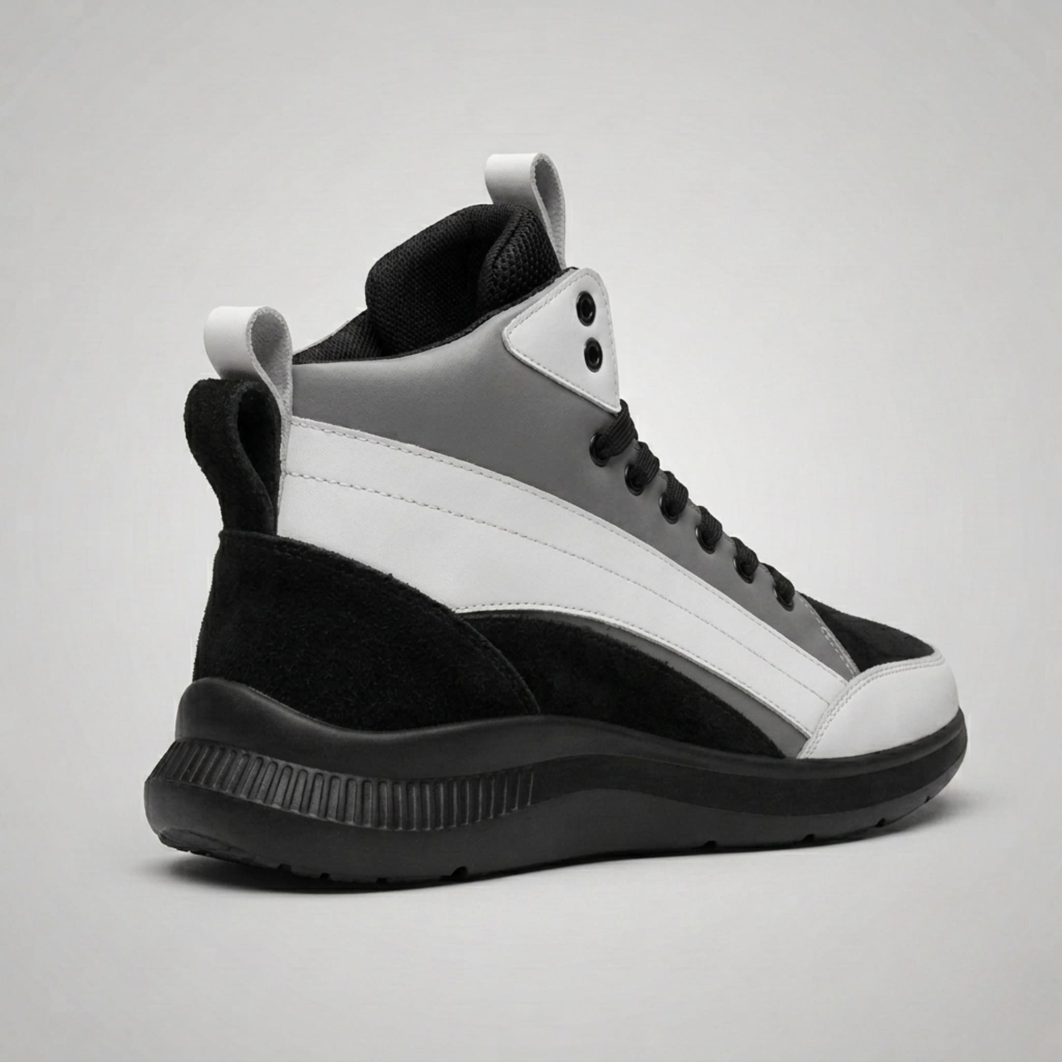 FORCIANO STRIDE grey, white and black height increasing sneakers shown from a rear three-quarter view.