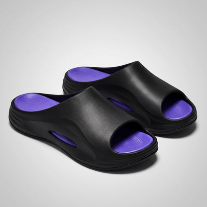 FORCIANO STRIKE Black Purple sandals height increasing shoes shown as a pair from a front three-quarter angle with purple footbeds and cushioned soles visible.