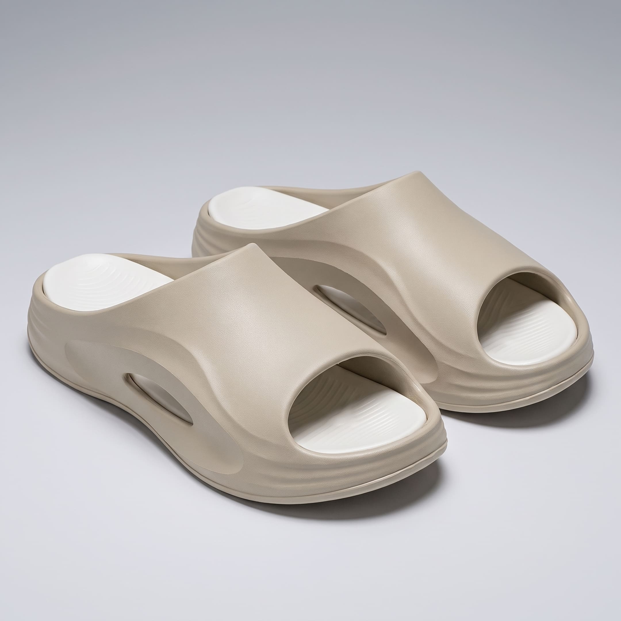 FORCIANO STRIKE khaki sandals height increasing shoes shown as a pair from a front three-quarter angle with white footbeds visible.
