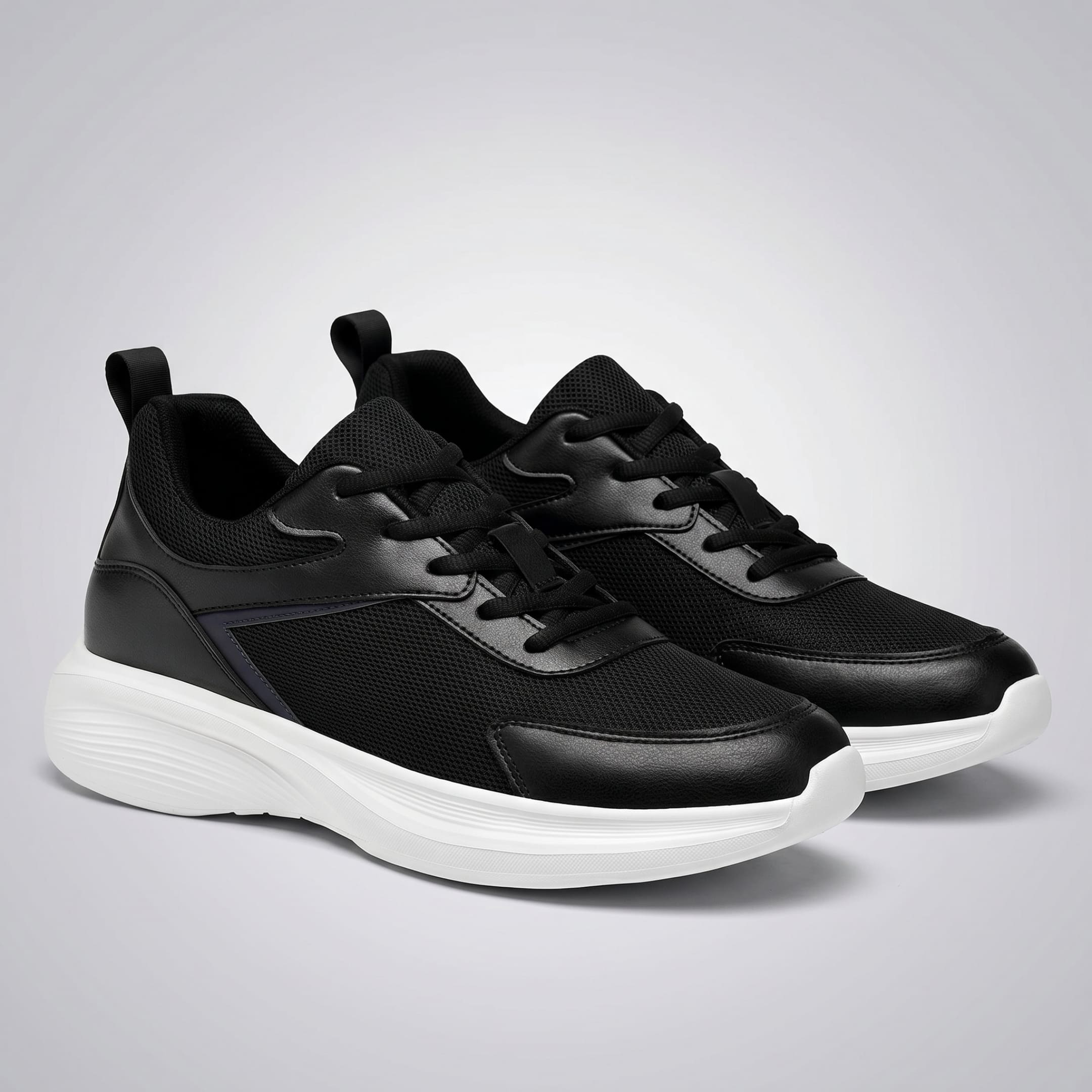 FORCIANO SUTTON black height increasing sneakers for women shown as a pair from the front three-quarter angle with Flyknit mesh uppers and white soles.