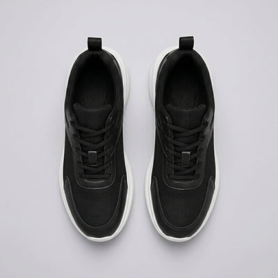 FORCIANO SUTTON black height increasing sneakers for Women shown as a pair from above with laces, Flyknit mesh uppers and white sole edges.