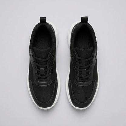 FORCIANO SUTTON black height increasing sneakers for women shown as a pair from above with laces, Flyknit mesh uppers and white sole edges.