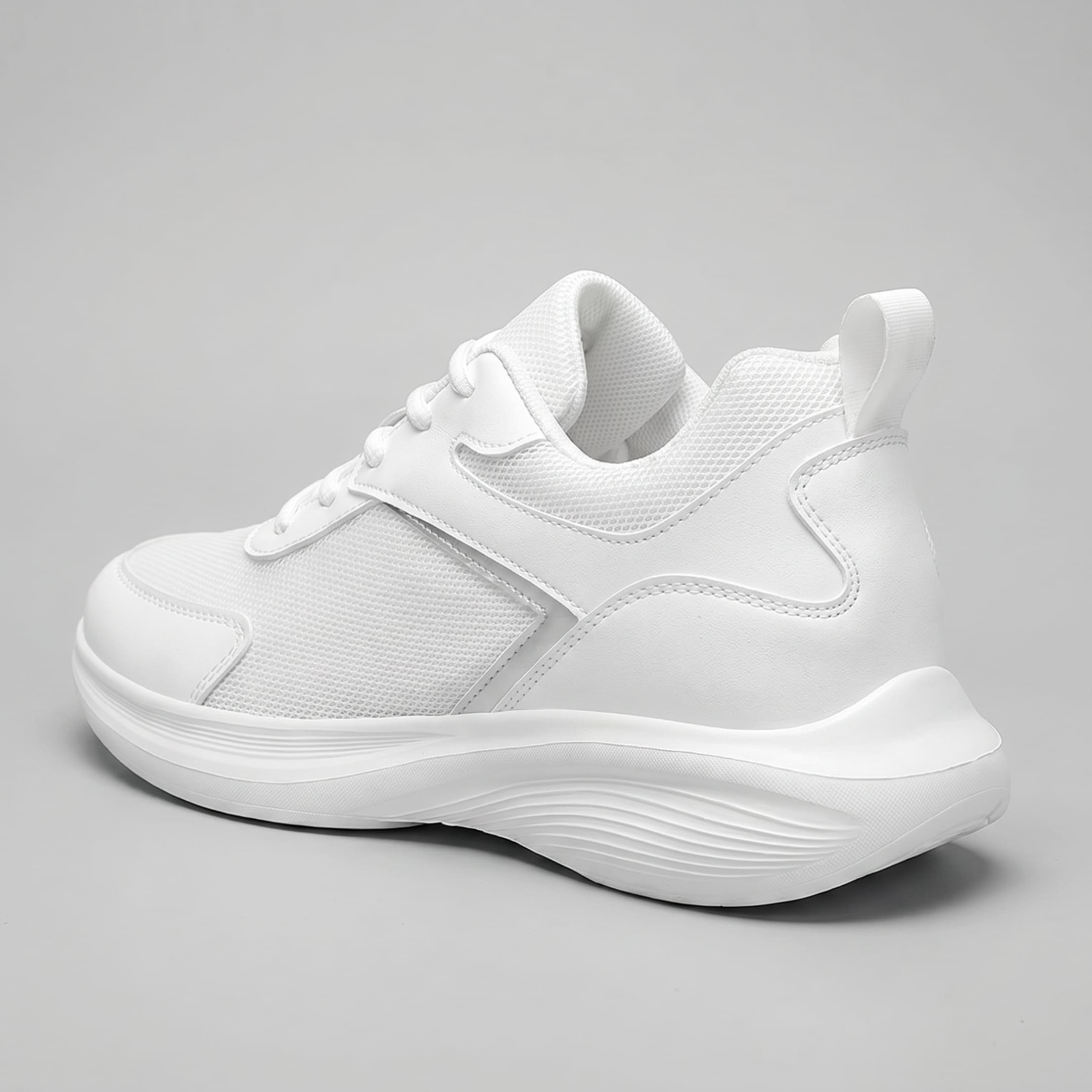 FORCIANO SUTTON white height increasing sneakers for women in rear three-quarter view, showing the Flyknit mesh upper, heel pull tab and sculpted white sole.