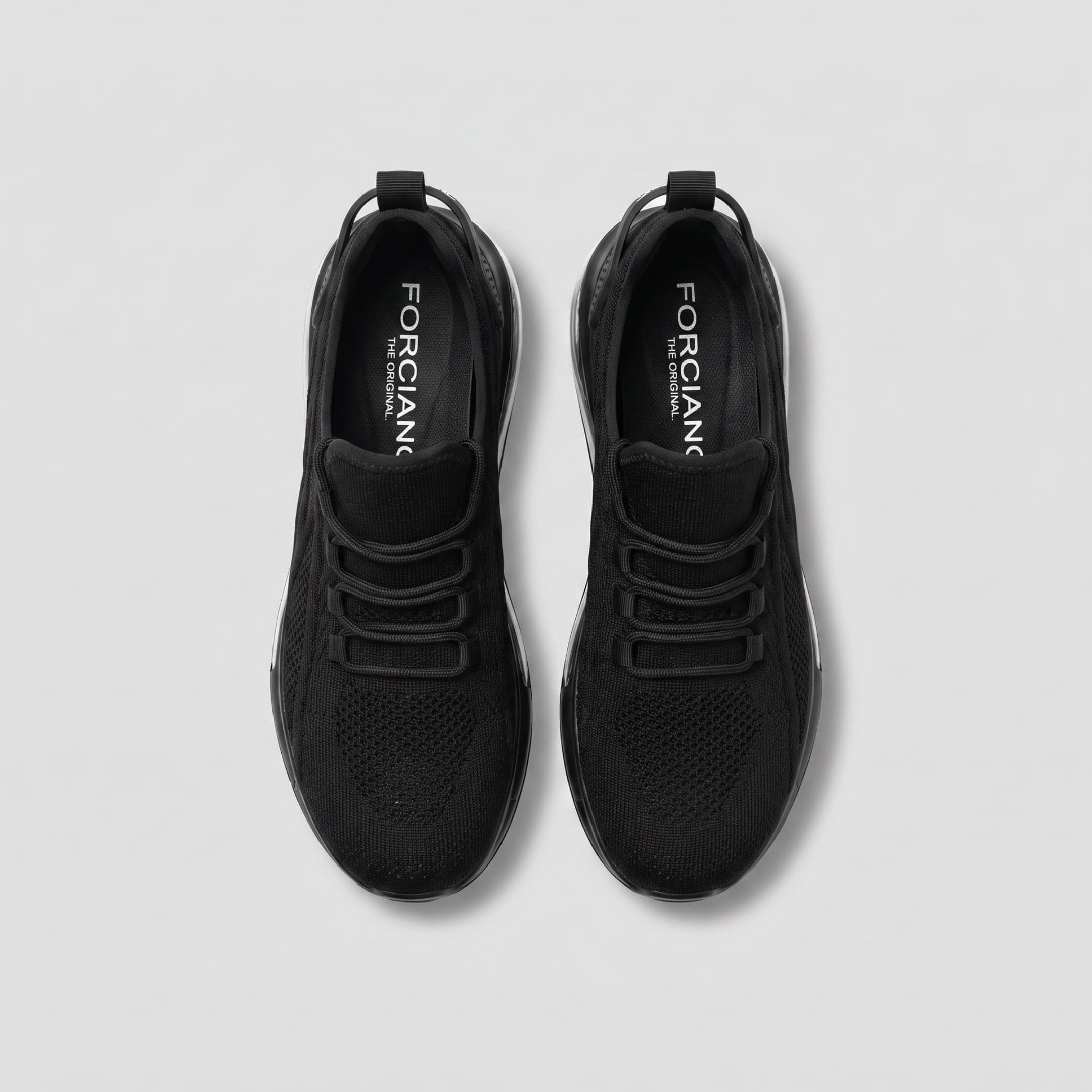 FORCIANO TENET black height increasing sneakers in breathable air mesh, pair shown from a top view with tonal lacing.