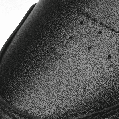 FORCIANO VADER black height increasing sneaker upper close-up showing fine surface texture, stitching, and small perforations.