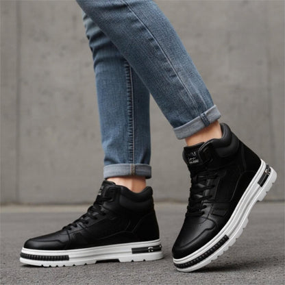 FORCIANO VADER black height increasing sneakers with white soles shown on-foot from a side angle with rolled jeans.