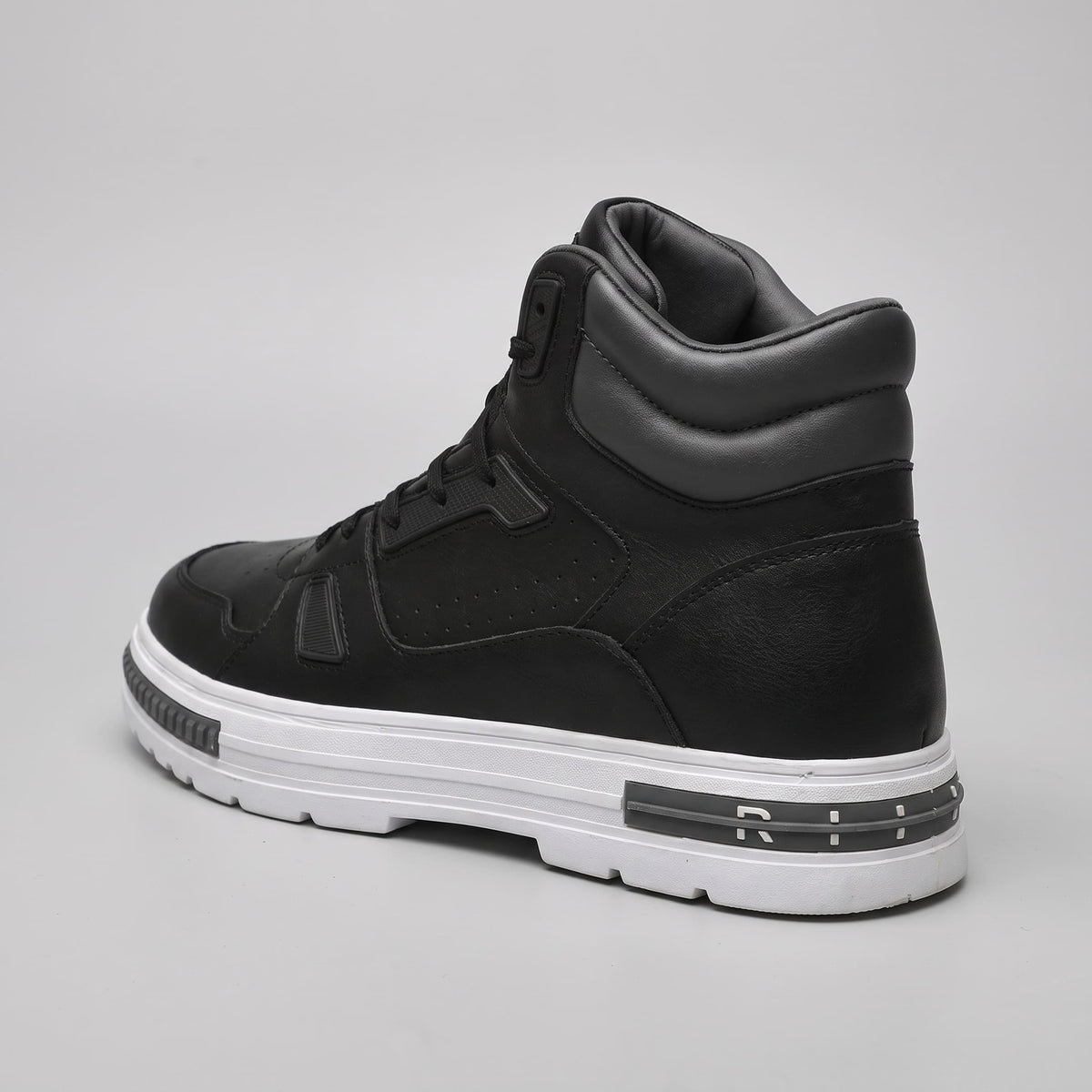 FORCIANO VADER Height Increasing Sneakers in black with white sole, shown from a rear three-quarter angle.